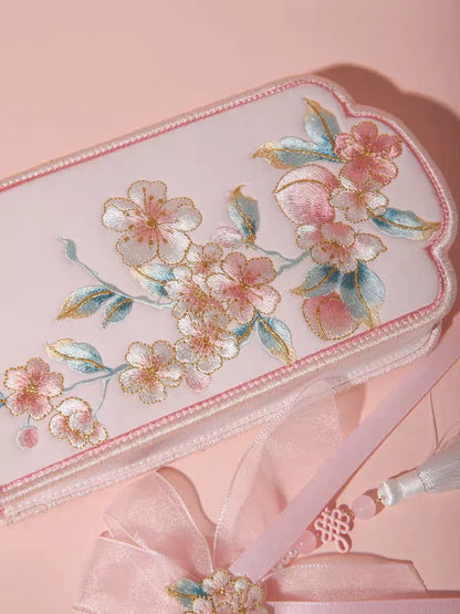 Elevate your style with the Blossom Bloom Embroidered Phone Bag. Explore our curated collection at Moon Accessories for a fashionable and functional accessory adorned with intricate cherry blossom embroidery, adding a touch of natural beauty to your ensemble.