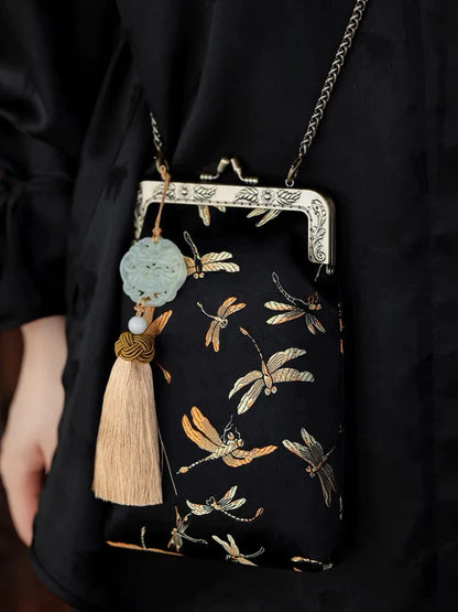 Immerse yourself in regal elegance with the Ming Dynasty Embroidered Crossbody Bag. Explore our curated collection at Moon Accessories for a timeless fusion of history and style, perfect for enhancing your ensemble with cultural sophistication.