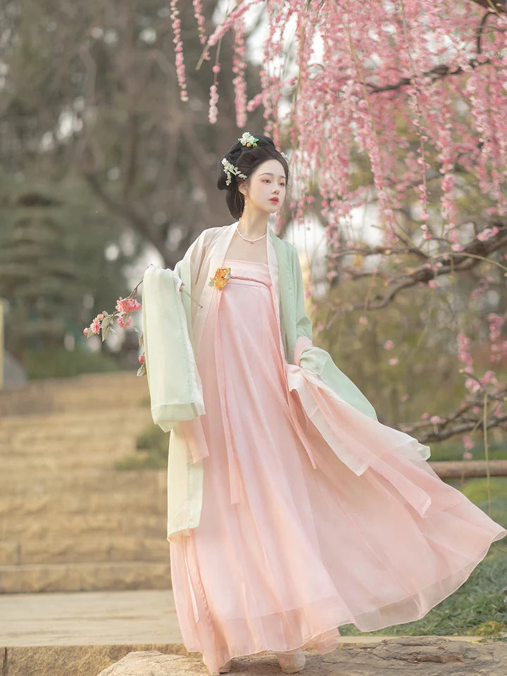 Embrace the grace of the season with our Graceful Qixiong Ruqun, Elegant Spring—an ensemble that captures the essence of timeless beauty and sophistication, ushering in the allure of the Tang Dynasty. Step into a blend of tradition and contemporary elegance, making a stylish nod to centuries past.