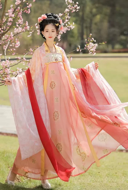 Bask in the radiance of our Radiant Qixiong Ruqun, Sunny Coral—a vibrant ensemble that brings the warmth of the sun and timeless elegance together in perfect harmony.