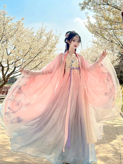 Immerse yourself in the vibrant allure of the Tang Dynasty with our Dynamic Hezi Qun, Vibrant Peach—an ensemble paying tribute to an era when style mirrored societal shifts. Influenced by Yang Guifei, this Tang Dynasty-inspired Qixiong Ruqun captures the historical trend, blending tradition with contemporary elegance. Step into the past with timeless influence, making a statement in style.