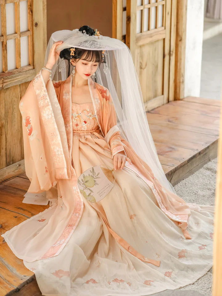 Embrace radiance with our Radiant Hezi Qun, Blushing Stephanie—an enchanting ensemble that captures the essence of timeless beauty and sophistication. Elevate your style with a blend of tradition and contemporary flair, making a statement that resonates with grace.