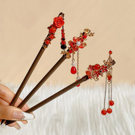 Discover the perfect balance of elegance and tradition with the Harmony of Chinese Hairpin Set. This carefully curated set features a collection of exquisite Chinese hairpins, each representing the rich cultural heritage of China. From delicate floral motifs to intricate designs, this set offers a harmonious blend of styles that can enhance any hairstyle or complement your Hanfu ensemble.