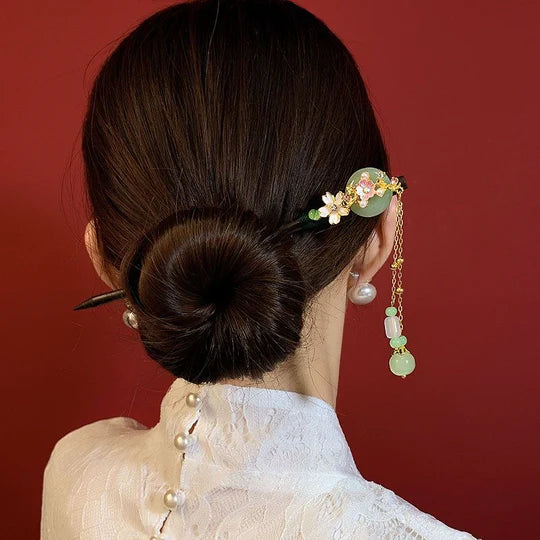 Elevate your style with this versatile Chinese Hairpin Set. Featuring a collection of beautifully crafted hairpins, this set offers a variety of traditional Chinese designs. From delicate floral patterns to intricate motifs, each hairpin is a unique accessory that adds a touch of elegance to any hairstyle. Embrace the cultural heritage of China with this captivating Chinese Hairpin Set and enhance your look with its timeless charm.