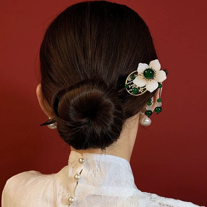 Elevate your style with this versatile Chinese Hairpin Set. Featuring a collection of beautifully crafted hairpins, this set offers a variety of traditional Chinese designs. From delicate floral patterns to intricate motifs, each hairpin is a unique accessory that adds a touch of elegance to any hairstyle. Embrace the cultural heritage of China with this captivating Chinese Hairpin Set and enhance your look with its timeless charm.