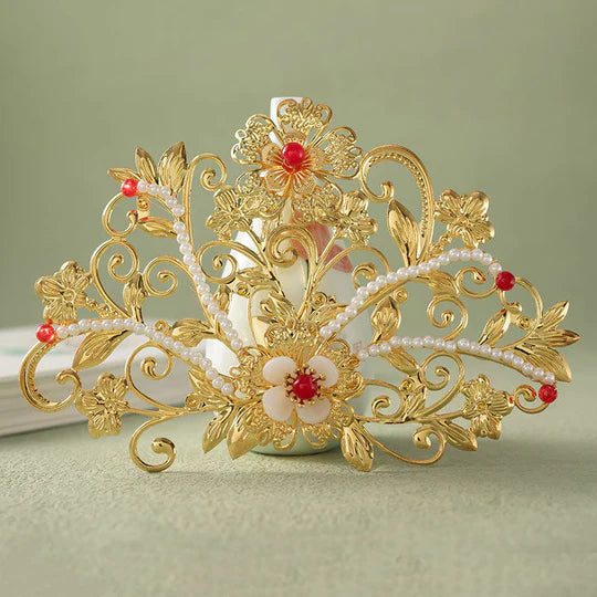 Enhance your Hanfu ensemble with the exquisite Hanfu Filigree Crown. This intricately designed crown features delicate filigree work, adding a regal touch to your hairstyle. Crafted with meticulous attention to detail, the Hanfu Filigree Crown is the perfect accessory to elevate your Hanfu look and make a statement with its timeless elegance.