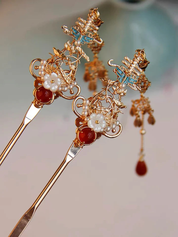 Achieve a sophisticated and traditional look with the Hanfu Hairstick. This elegant accessory is designed to effortlessly secure and adorn your hair, adding a touch of grace to your Hanfu ensemble. Crafted with intricacy and inspired by the beauty of traditional Chinese culture, the Hanfu Hairstick showcases a timeless charm that complements a variety of hairstyles. Embrace the essence of Hanfu fashion with the exquisite Hanfu Hairstick and elevate your style with its refined simplicity.