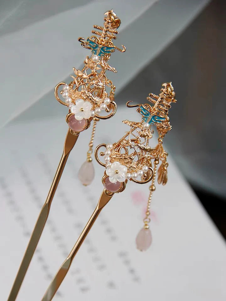 Achieve a sophisticated and traditional look with the Hanfu Hairstick. This elegant accessory is designed to effortlessly secure and adorn your hair, adding a touch of grace to your Hanfu ensemble. Crafted with intricacy and inspired by the beauty of traditional Chinese culture, the Hanfu Hairstick showcases a timeless charm that complements a variety of hairstyles. Embrace the essence of Hanfu fashion with the exquisite Hanfu Hairstick and elevate your style with its refined simplicity.