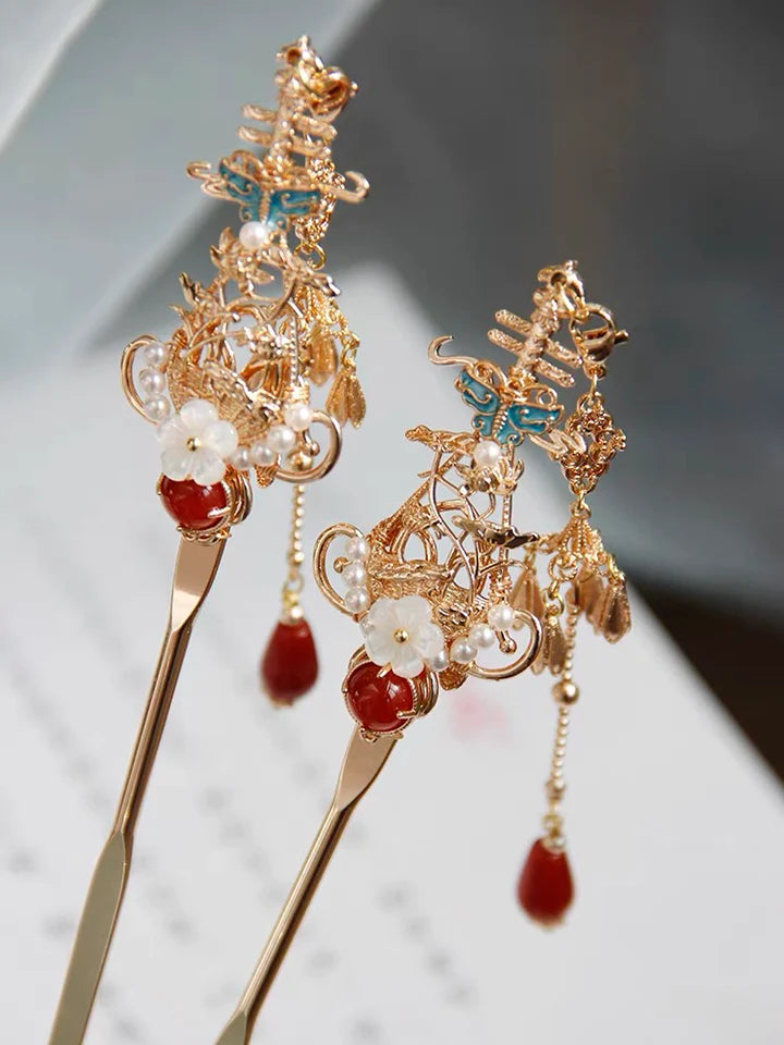 Achieve a sophisticated and traditional look with the Hanfu Hairstick. This elegant accessory is designed to effortlessly secure and adorn your hair, adding a touch of grace to your Hanfu ensemble. Crafted with intricacy and inspired by the beauty of traditional Chinese culture, the Hanfu Hairstick showcases a timeless charm that complements a variety of hairstyles. Embrace the essence of Hanfu fashion with the exquisite Hanfu Hairstick and elevate your style with its refined simplicity.