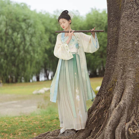 **Alt Text for Image:** &quot;Enchanting Fern Qiyao Ruqun Ensemble - Song Dynasty Style. A fusion of historical charm and contemporary elegance, perfect for themed events or infusing sophistication into your wardrobe.&quot;