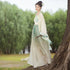 **Alt Text for Image:** "Enchanting Fern Qiyao Ruqun Ensemble - Song Dynasty Style. A fusion of historical charm and contemporary elegance, perfect for themed events or infusing sophistication into your wardrobe."