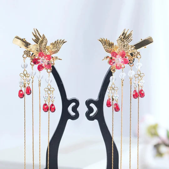 Flying Bird Hanfu Hair Clips - Add whimsy and nature-inspired beauty to your Hanfu hairstyle with these enchanting hair clips. Intricate details inspired by flying birds exude grace and charm. Perfect for special occasions, cultural events, or showcasing your love for nature and Hanfu fashion.