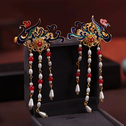 Reona Hanfu Hair Clips - Enhance your Hanfu hairstyle with these exquisite hair clips. Intricate detailing inspired by Hanfu fashion exudes elegance and charm. Perfect for special occasions, cultural events, or showcasing your appreciation for Hanfu fashion.