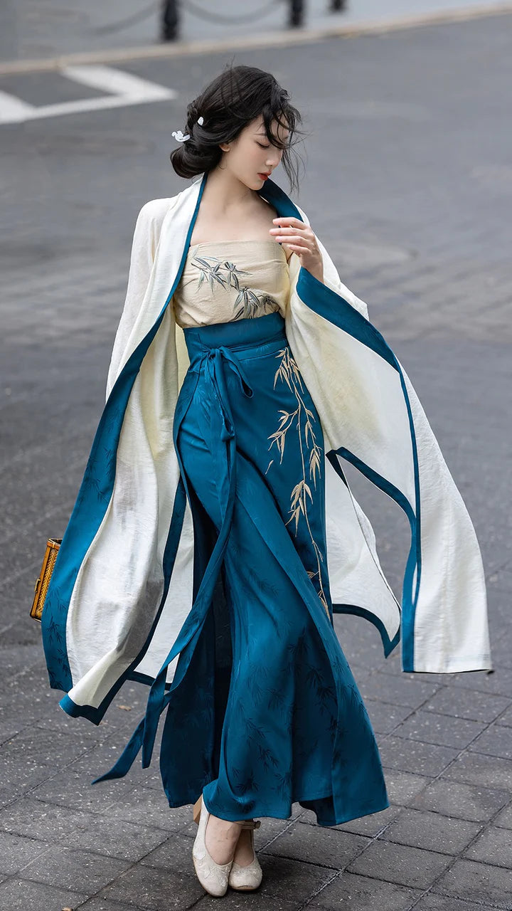 Dazzle in the elegance of Blue Diamond Modern Hanfu—a perfect fusion of tradition and contemporary allure. Elevate your wardrobe with this captivating ensemble, embodying the timeless beauty of ancient Chinese fashion. Blue Diamond&