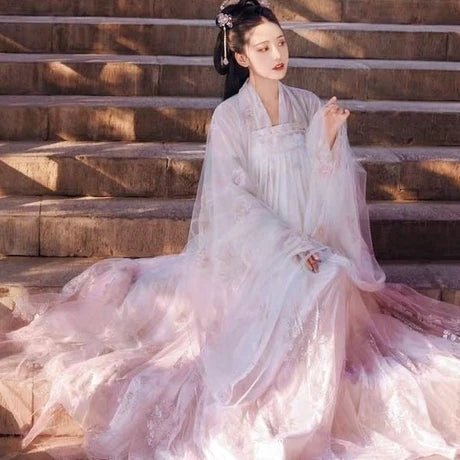 Step into enchantment with the Qixiong Ruqun, captured in the Whimsical Winona ensemble. Immerse yourself in the delightful blend of tradition and contemporary allure, embodying a whimsical and stylish flair that adds a touch of magic to your wardrobe.