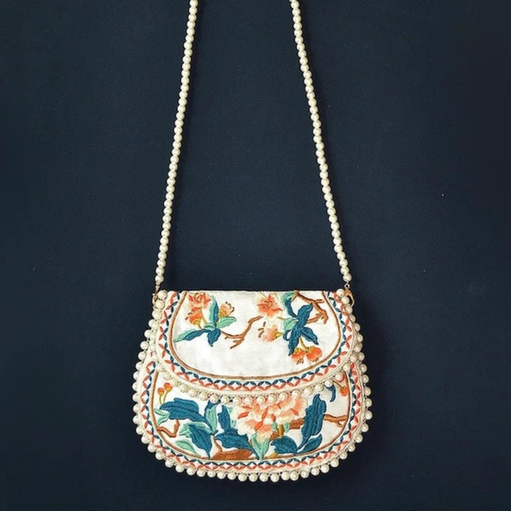 Immerse yourself in regal elegance with the Ming Dynasty Embroidered Crossbody Bag. Explore our curated collection at Moon Accessories for a timeless fusion of history and style, perfect for enhancing your ensemble with cultural sophistication.