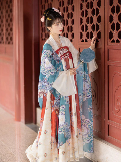 Immerse yourself in the allure of the Tang Dynasty with our Timeless Qixiong Ruqun Ensemble, paying tribute to an era when style reflected societal shifts. Influenced by Yang Guifei, this ensemble captures the preference for plumper figures, encapsulating a unique chapter in feminine ideals. The regal &quot;Da Xiu Shan&quot; coat, adorned with Flourishing Paisley, merges tradition with contemporary elegance. Step out in style, embracing timeless influence with a nod to centuries past.