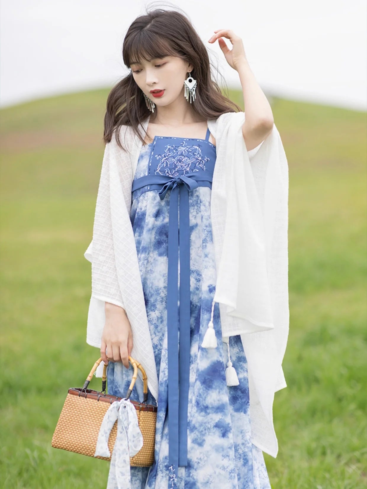 Step into a world of refined beauty with Modern Hanfu Elegance—a seamless fusion of traditional grace and contemporary style. Embrace the allure of ancient Chinese fashion, elevating your wardrobe with timeless elegance and cultural sophistication. Rediscover the past while embracing the sophistication of the present in this captivating ensemble.