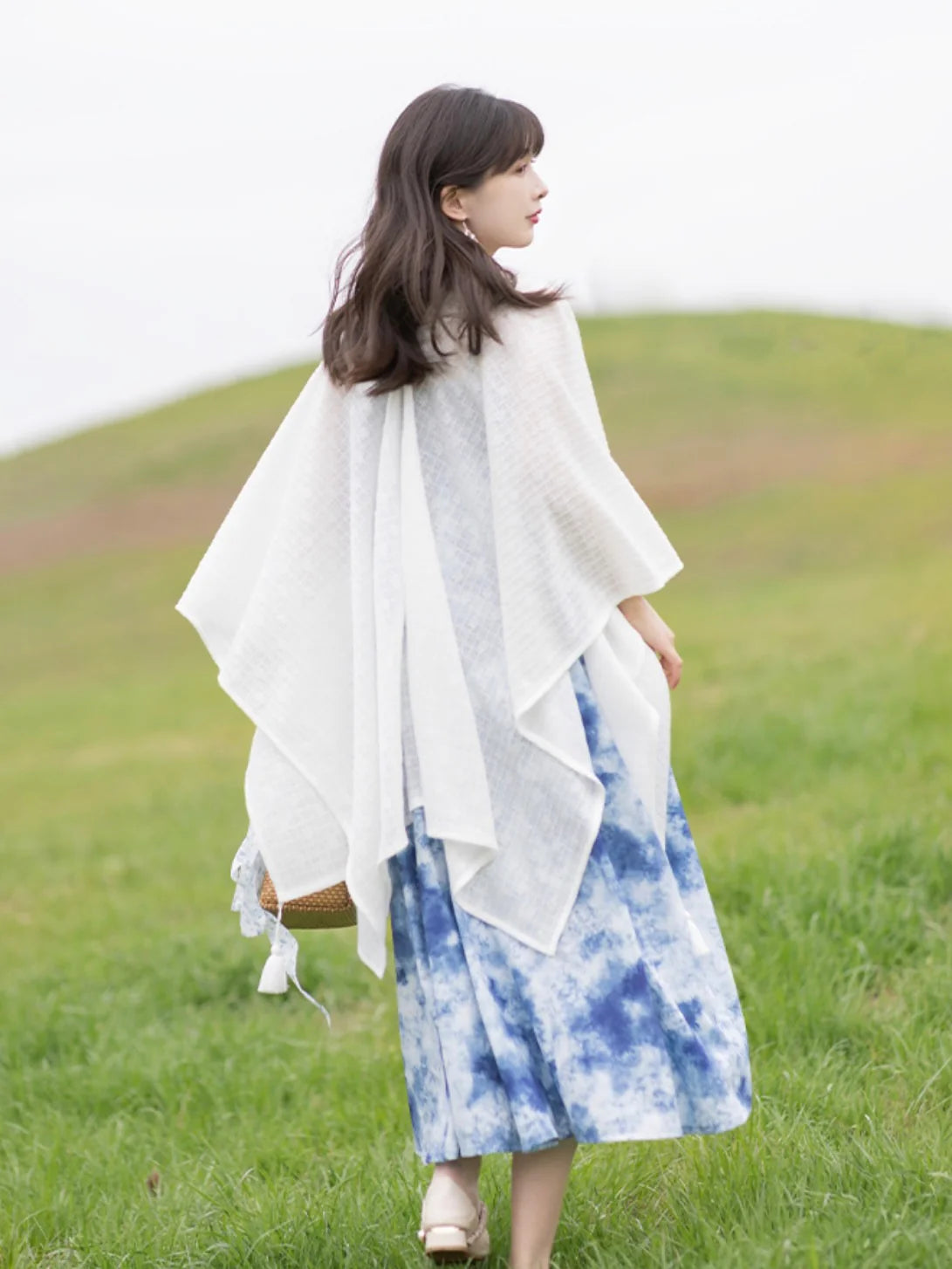 Step into a world of refined beauty with Modern Hanfu Elegance—a seamless fusion of traditional grace and contemporary style. Embrace the allure of ancient Chinese fashion, elevating your wardrobe with timeless elegance and cultural sophistication. Rediscover the past while embracing the sophistication of the present in this captivating ensemble.