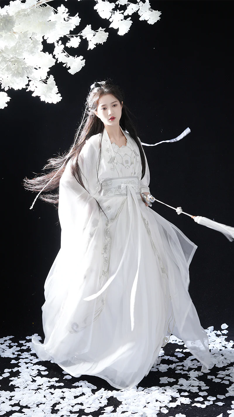 Immerse yourself in the allure of the Tang Dynasty with our Inviting Qiyao Ruqun, Cozy Camryn—an ensemble that pays homage to a bygone era when style reflected societal shifts. Influenced by Yang Guifei, this Tang Dynasty-inspired Qixiong Ruqun captures historical trends, merging tradition with contemporary elegance. Step out in style, embracing the timeless influence of centuries past.