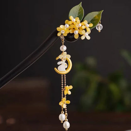 Moon Fairy Hanfu Hairpin - Channel the ethereal beauty of a moon fairy with this enchanting hairpin. Delicate details inspired by celestial nights evoke a touch of mystical elegance. Perfect for traditional ceremonies, cultural events, or embracing the enchanting spirit of a moon fairy.