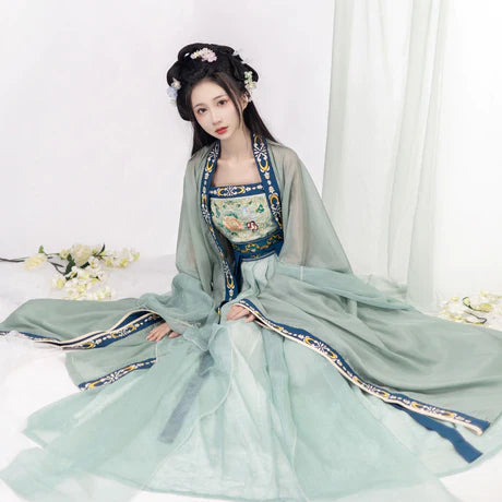 Immerse yourself in the grace of the Hezi Qun, beautifully captured in the Gracious Aurora ensemble. This captivating attire seamlessly blends tradition with a touch of contemporary charm. Step into the radiant allure of this outfit, embodying a gracious and timeless style that adds a touch of elegance to your wardrobe.