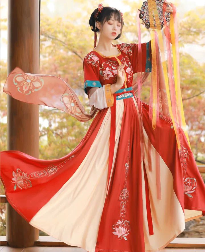 Revel in the vibrant elegance of Radiant Scarlet Qiyao Ruqun, a captivating ensemble inspired by the aesthetics of the Qiyao period. This exquisite attire pays homage to an era when grace and beauty flourished, capturing the timeless essence of historical allure.