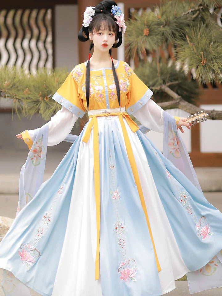 Revel in the vibrant elegance of Radiant Scarlet Qiyao Ruqun, a captivating ensemble inspired by the aesthetics of the Qiyao period. This exquisite attire pays homage to an era when grace and beauty flourished, capturing the timeless essence of historical allure.