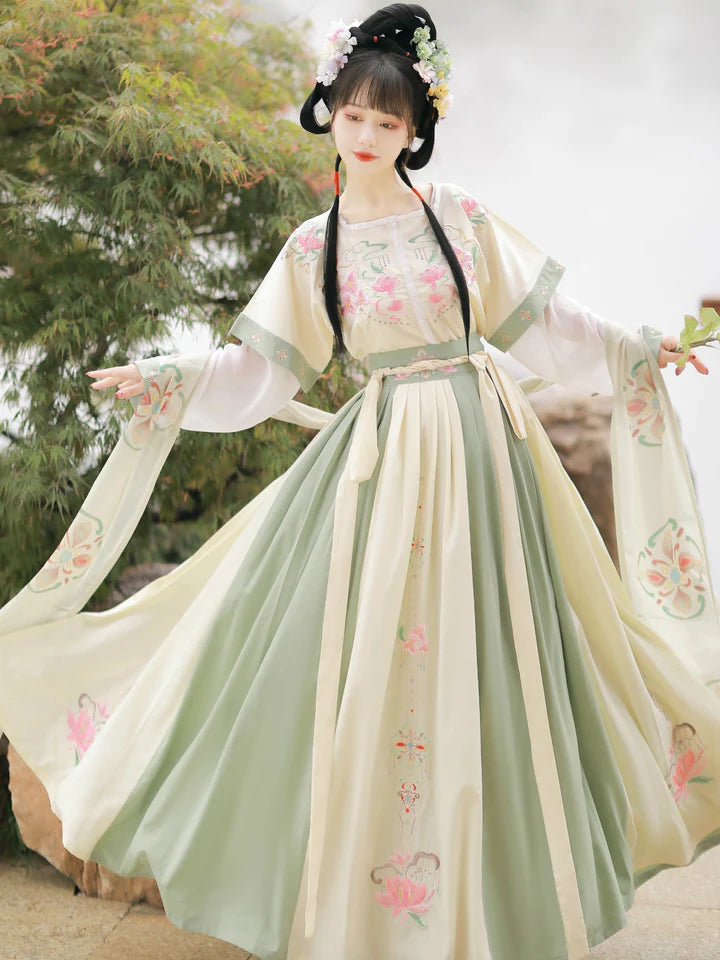 Revel in the vibrant elegance of Radiant Scarlet Qiyao Ruqun, a captivating ensemble inspired by the aesthetics of the Qiyao period. This exquisite attire pays homage to an era when grace and beauty flourished, capturing the timeless essence of historical allure.