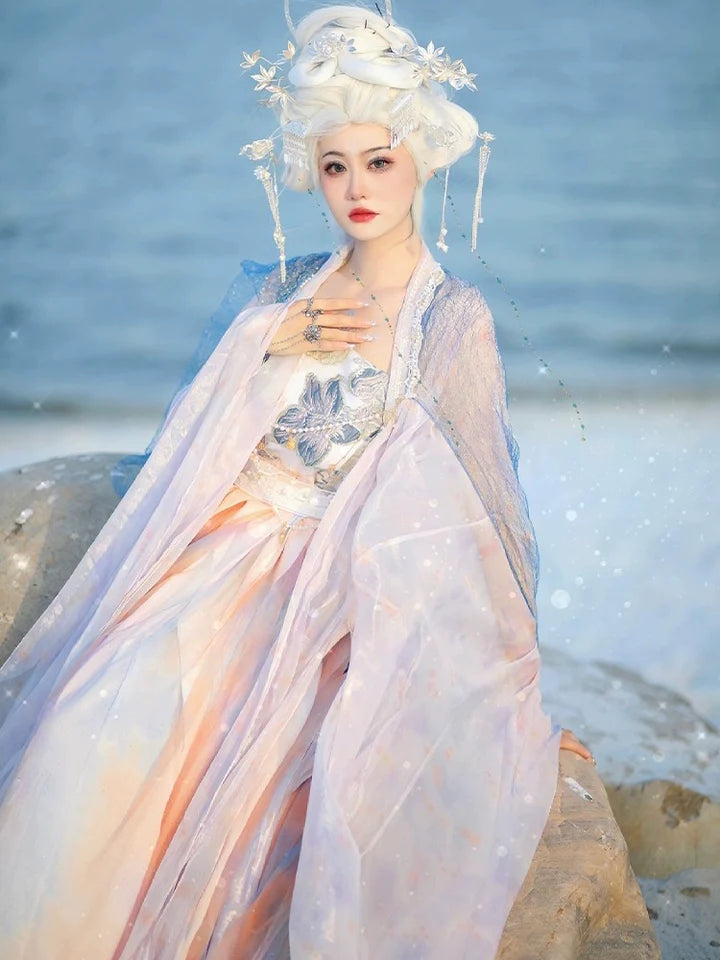 Discover the refined grace of Classical Maiden Hezi Qun, a masterpiece that seamlessly combines historical allure with classical beauty. Adorned with intricate details, this ensemble invites you to step into a world of timeless elegance inspired by the Southern Song dynasty.