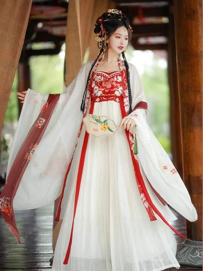 Explore the captivating charm of Alluring Hana Hezi Qun, a masterpiece that harmoniously combines historical allure with the grace of blooming hana blossoms. Adorned with intricate details, this ensemble invites you to step into a world of timeless elegance inspired by the Southern Song dynasty.