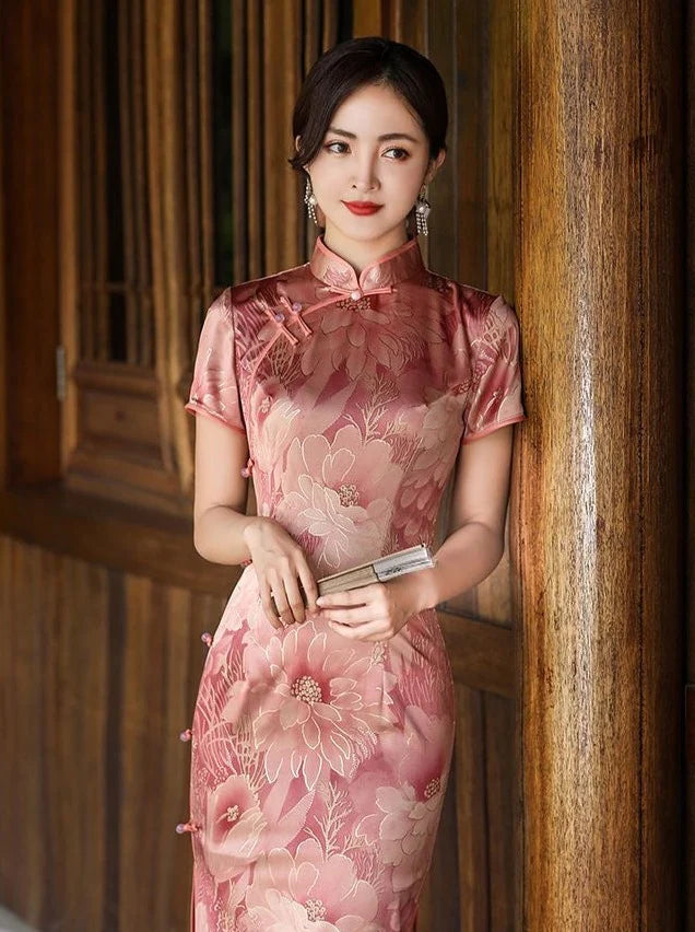 Step into timeless elegance with the Qipao, also known as cheongsam—a Chinese dress that embodies tradition, femininity, and style. Originating in the 1920s, its figure-hugging silhouette, high collar, and side slits have become iconic.