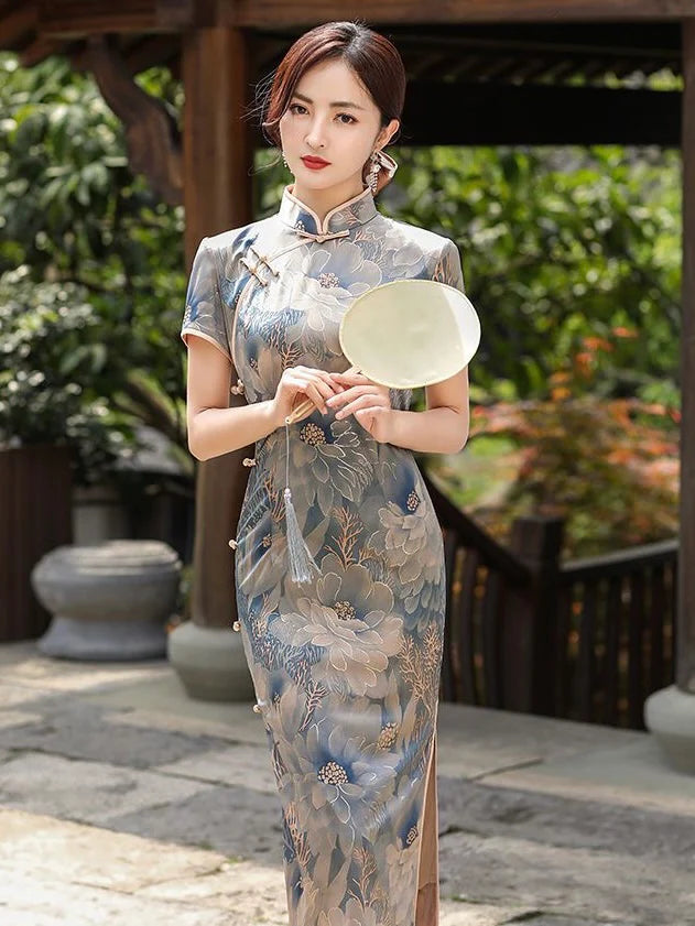 Step into timeless elegance with the Qipao, also known as cheongsam—a Chinese dress that embodies tradition, femininity, and style. Originating in the 1920s, its figure-hugging silhouette, high collar, and side slits have become iconic.