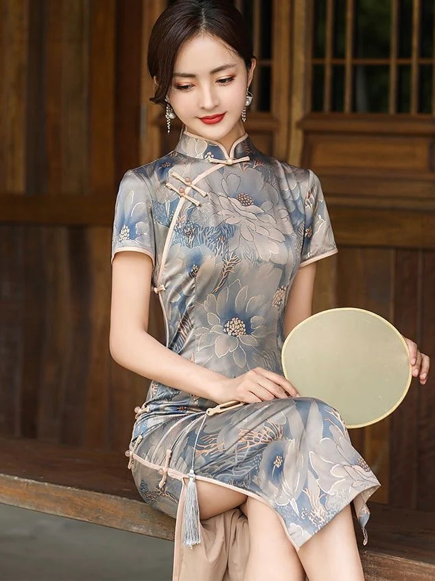 Step into timeless elegance with the Qipao, also known as cheongsam—a Chinese dress that embodies tradition, femininity, and style. Originating in the 1920s, its figure-hugging silhouette, high collar, and side slits have become iconic.