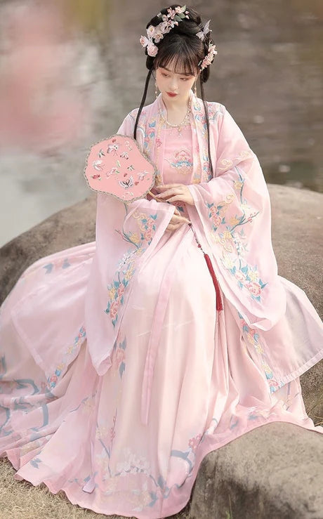 Step into enchantment with the Qiyao Ruqun, embodied in the delightful Fluffy Flora ensemble. This captivating attire harmoniously combines tradition and contemporary charm. Immerse yourself in the whimsical allure of this outfit, inspired by a dreamy and floral aesthetic that adds a touch of softness and elegance to your style.