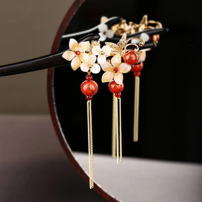 Spring Chinese Hairpins - Celebrate the beauty of spring with these enchanting hairpins. Delicate designs inspired by blooming flowers add freshness and elegance. Perfect for garden parties, cultural events, or embracing the spirit of renewal.