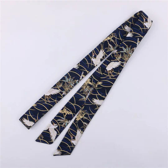 Navy Hanfu Hair Tie - Complete your Hanfu ensemble with the stylish Navy Hanfu Hair Tie. Its sleek design and deep navy color add sophistication and elegance to your hairstyle. Stay comfortable and secure throughout the day with this versatile accessory.