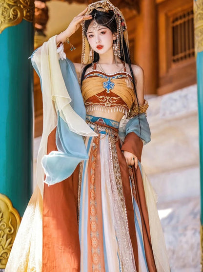 Step into the captivating world of Stella Dunhuang Hanfu, a harmonious blend of Central Asian, Tibetan, Indian, and Chinese influences exclusively curated by Moon Hanfu. Originating from the northwest Chinese region along the Silk Road, this traditional attire from our Dunhuang Collection reflects the diverse cultural interactions of the area. Embrace vibrant colors that showcase the region&