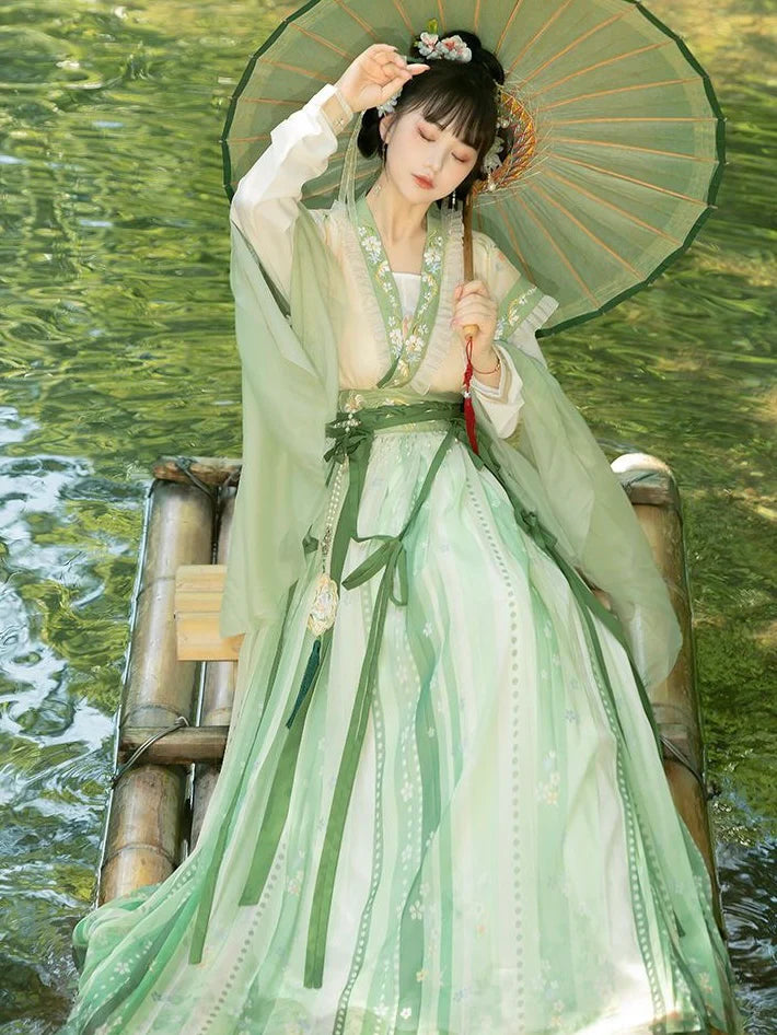 Grace your wardrobe with the Qiyao Ruqun, elegantly embodied in the Elegant Ivy ensemble. This captivating attire seamlessly blends tradition with a touch of contemporary charm. Step into the refined allure of this outfit, embodying an elegant and timeless style that adds a touch of sophistication to your look.