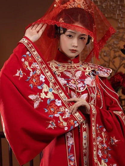 Explore the allure of Ming dynasty-inspired fashion with the exquisite Li Ling Shan, Queenie collection. Immerse yourself in the timeless elegance of traditional Chinese clothing, blending ancient charm seamlessly with contemporary allure.