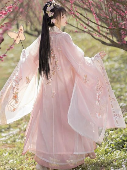 Blossom in radiant style with our Radiant Qiyao Ruqun, Rosy Blossom—an enchanting ensemble that embodies the timeless beauty and grace of a blooming flower. Elevate your look with a blend of tradition and contemporary elegance, making a statement inspired by the allure of nature.