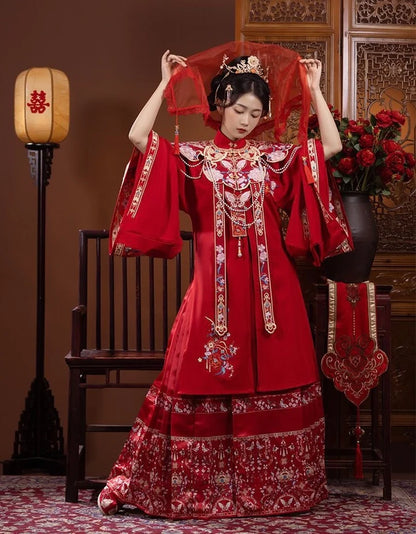 Explore the allure of Ming dynasty-inspired fashion with the exquisite Li Ling Shan, Queenie collection. Immerse yourself in the timeless elegance of traditional Chinese clothing, blending ancient charm seamlessly with contemporary allure.