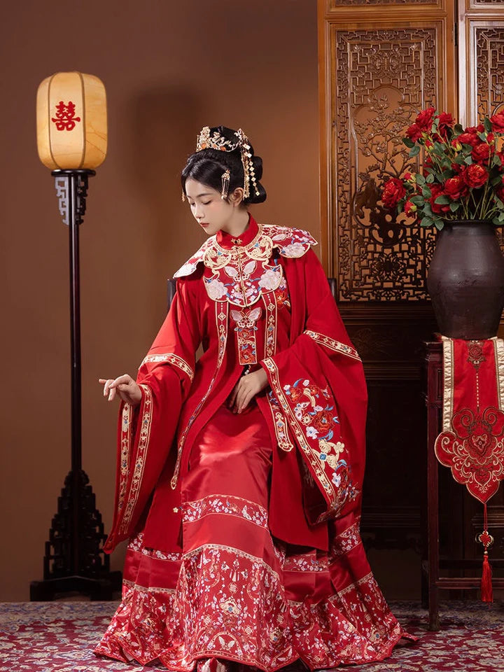 Explore the allure of Ming dynasty-inspired fashion with the exquisite Li Ling Shan, Queenie collection. Immerse yourself in the timeless elegance of traditional Chinese clothing, blending ancient charm seamlessly with contemporary allure.