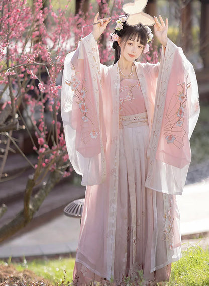 Blossom in radiant style with our Radiant Qiyao Ruqun, Rosy Blossom—an enchanting ensemble that embodies the timeless beauty and grace of a blooming flower. Elevate your look with a blend of tradition and contemporary elegance, making a statement inspired by the allure of nature.