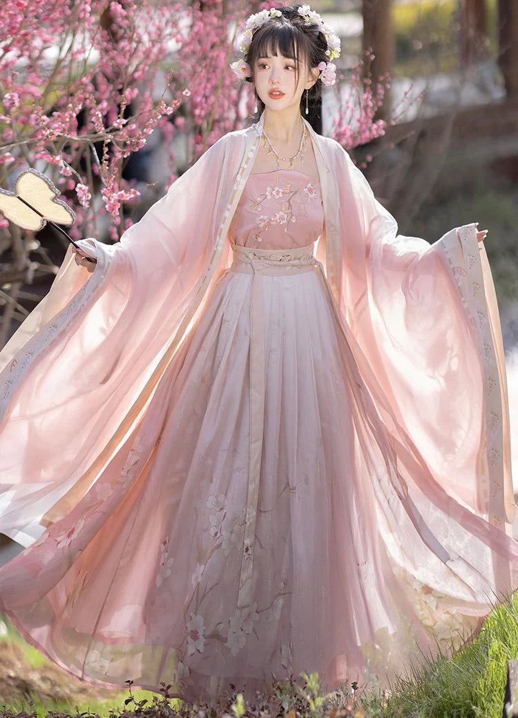 Blossom in radiant style with our Radiant Qiyao Ruqun, Rosy Blossom—an enchanting ensemble that embodies the timeless beauty and grace of a blooming flower. Elevate your look with a blend of tradition and contemporary elegance, making a statement inspired by the allure of nature.