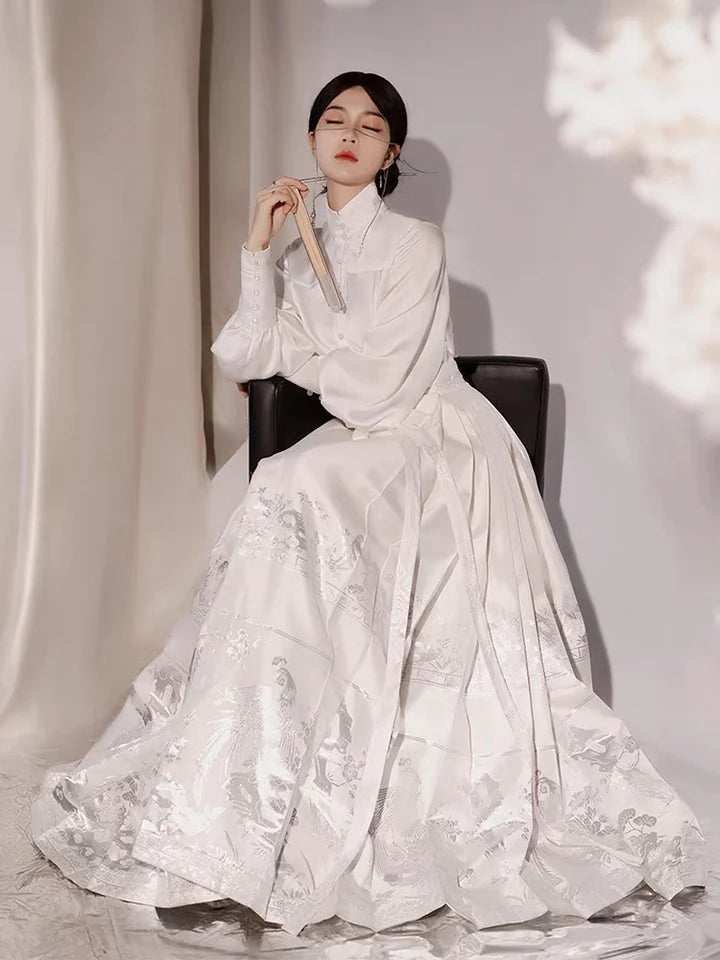 Elevate your style with the Regal Elegance Modern Hanfu Ensemble, a harmonious blend of modern sophistication and timeless beauty. Immerse yourself in the allure of our Modern Hanfu collection, seamlessly capturing the essence of tradition with a contemporary touch. Discover the sophistication and grace of traditional Chinese fashion with the Regal Elegance