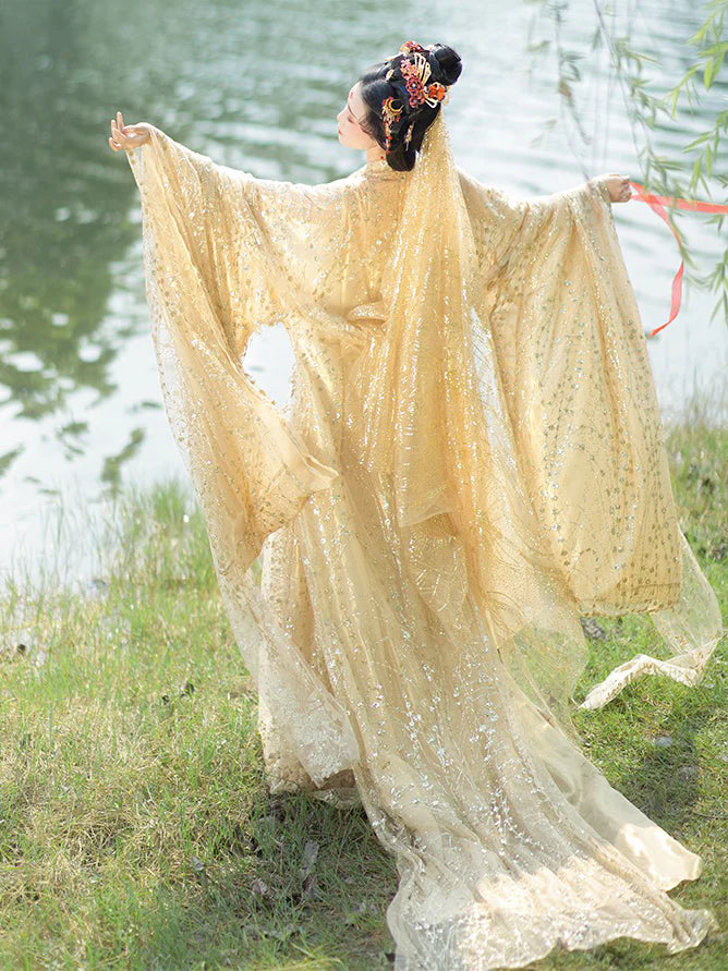 Infuse your style with vibrancy wearing our Vibrant Hezi Qun, Blooming Dahlia—an exquisite ensemble that blossoms with timeless beauty and elegance.