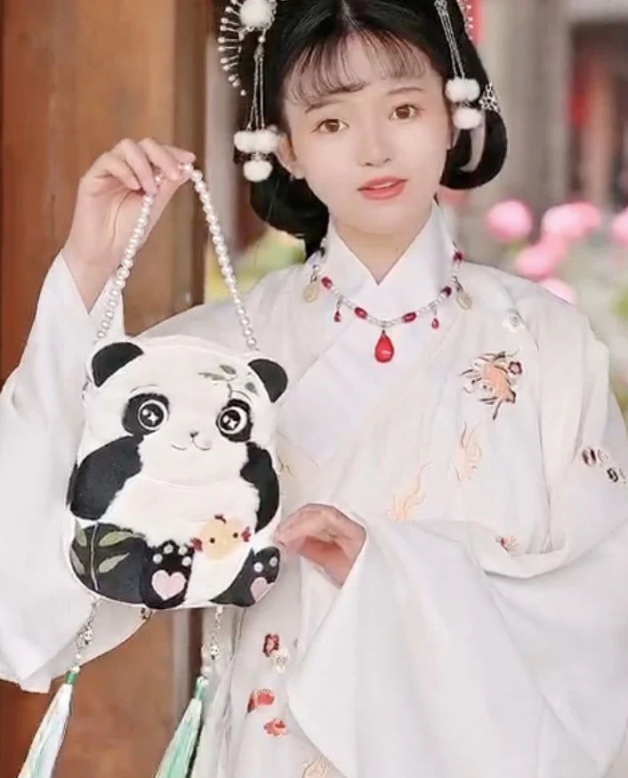 Carry charm wherever you go with the Adorable Panda Crossbody Bag. Explore our curated collection at Moon Accessories for a playful and stylish addition to your ensemble, capturing the essence of cuteness and convenience.