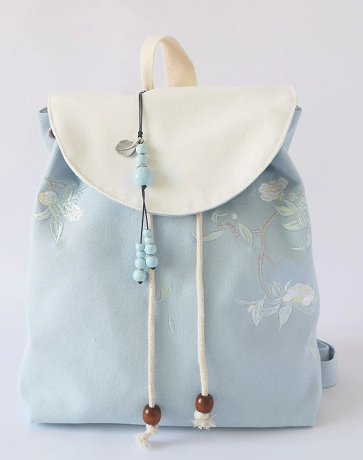 Carry your essentials in style with the Blossom Floral Backpack. Explore our curated collection at Moon Accessories for a fashionable and functional accessory adorned with delightful floral patterns, adding a touch of natural beauty to your everyday adventures.