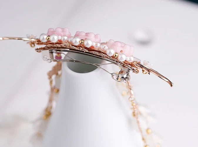 Mia Hanfu Hairpin - Elevate your Hanfu ensemble with the graceful beauty of the Mia Hanfu Hairpin. Its delicate and intricately crafted design adds a touch of sophistication and cultural heritage. Perfect for special occasions and cultural events, this hairpin embodies timeless beauty.